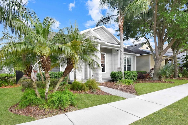 view of front of home with a front lawn