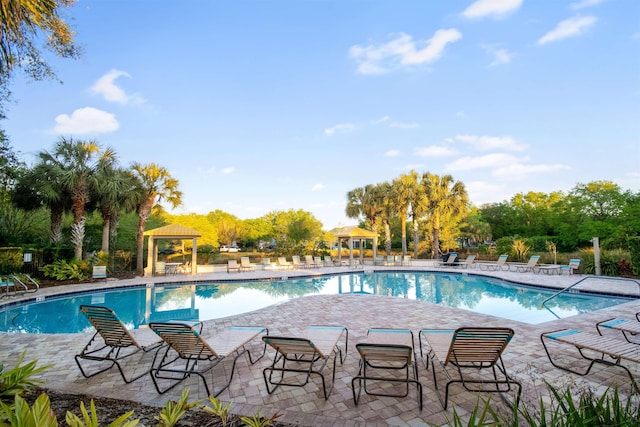 view of swimming pool featuring a gazebo and a patio