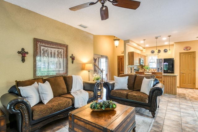 998 Aragon Ave, Saint Augustine, FL 32086 - living area with ceiling fan and light tile patterned floors