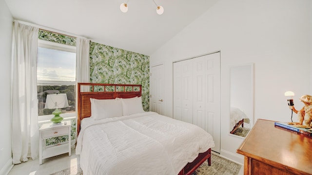 bedroom featuring lofted ceiling