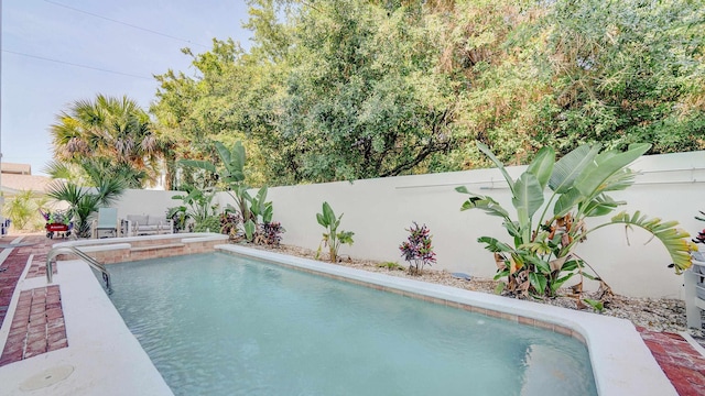 view of pool with a fenced in pool and a fenced backyard