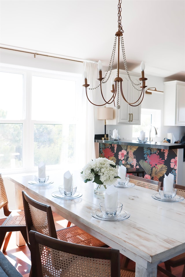 dining area featuring a chandelier