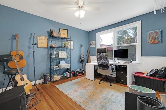 office area with ceiling fan and hardwood / wood-style floors