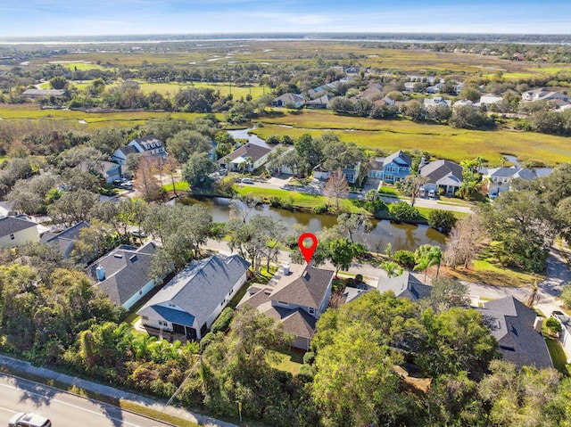 aerial view featuring a water view