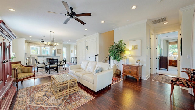 living area featuring ornamental molding, dark wood-style floors, recessed lighting, baseboards, and ceiling fan