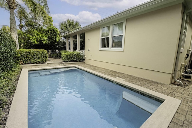 outdoor pool featuring a patio area