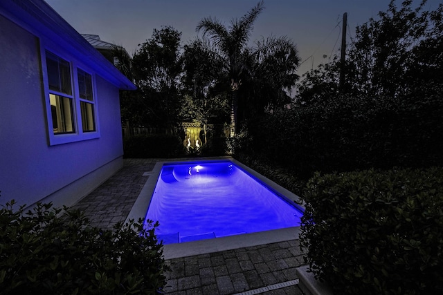 pool featuring fence