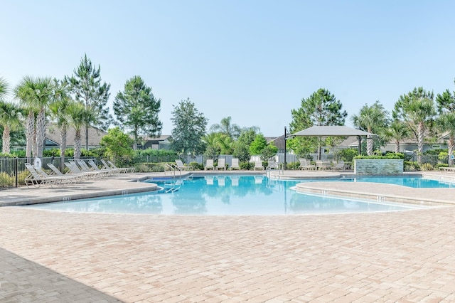 community pool with a patio
