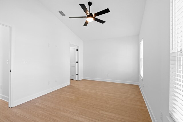237 Jackson Blvd, Saint Augustine, FL 32095 - spare room featuring high vaulted ceiling, a ceiling fan, light wood-type flooring, baseboards, and visible vents
