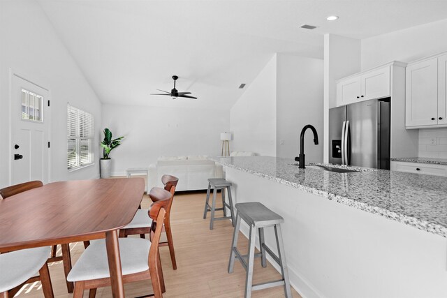 237 Jackson Blvd, Saint Augustine, FL 32095 - dining area with visible vents, ceiling fan, recessed lighting, light wood-type flooring, and vaulted ceiling