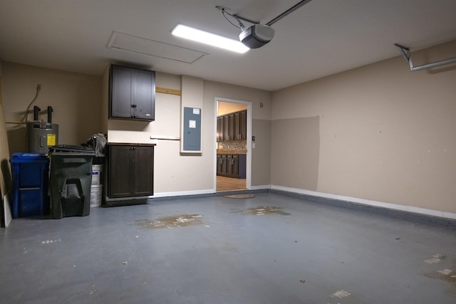 garage featuring electric panel, water heater, and a garage door opener