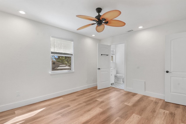 155 Drake Rd, Saint Augustine, FL 32086 - unfurnished bedroom with baseboards, light wood-type flooring, connected bathroom, recessed lighting, and a ceiling fan