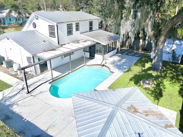 155 Drake Rd, Saint Augustine, FL 32086 - view of swimming pool featuring a sunroom and a patio