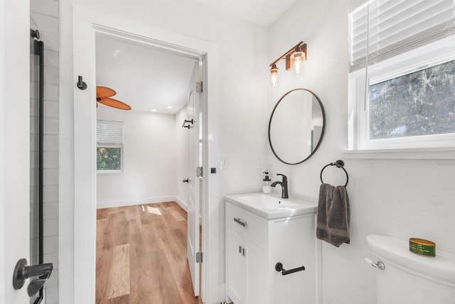 155 Drake Rd, Saint Augustine, FL 32086 - full bath with vanity, toilet, wood finished floors, and baseboards