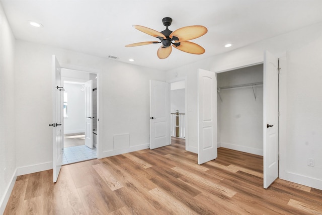 155 Drake Rd, Saint Augustine, FL 32086 - unfurnished bedroom with light wood-type flooring, recessed lighting, baseboards, and connected bathroom
