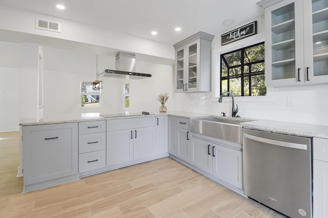155 Drake Rd, Saint Augustine, FL 32086 - kitchen featuring stainless steel dishwasher, wall chimney range hood, a peninsula, black electric cooktop, and a sink