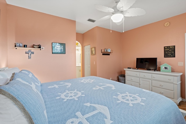 bedroom with visible vents, ceiling fan, and wood finished floors