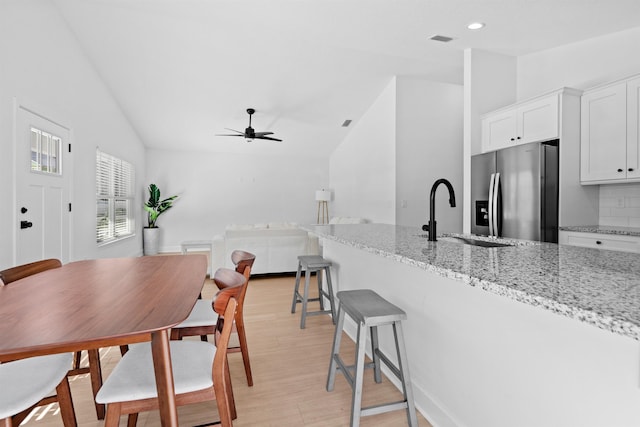 241 Jackson Blvd, Saint Augustine, FL 32095 - dining area with lofted ceiling, visible vents, light wood-style floors, ceiling fan, and recessed lighting