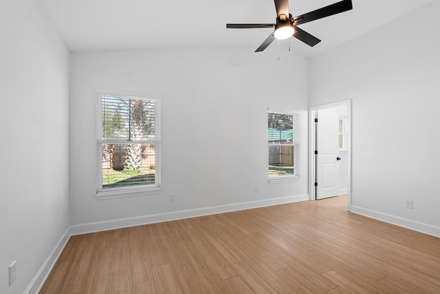 241 Jackson Blvd, Saint Augustine, FL 32095 - unfurnished room featuring baseboards, a healthy amount of sunlight, a ceiling fan, and light wood finished floors