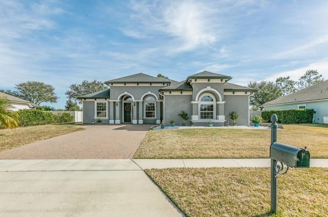 view of front of home with a front lawn