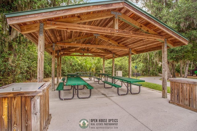 view of property's community featuring a patio area