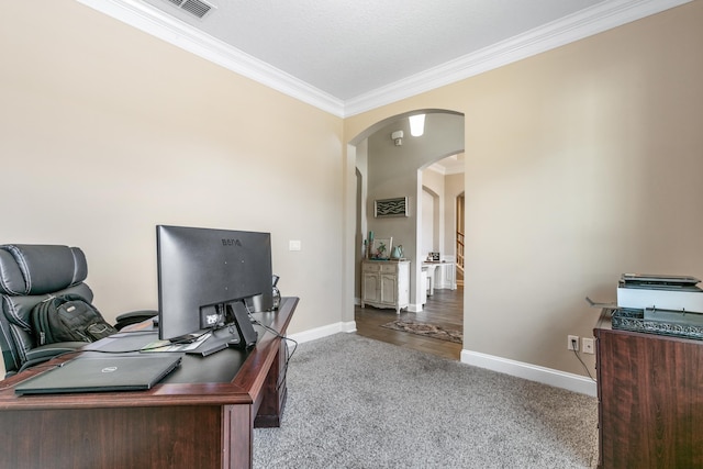 carpeted home office featuring ornamental molding