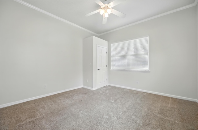 500 Seagate Ln, Saint Augustine, FL 32084 - carpeted empty room with ornamental molding, baseboards, and a ceiling fan