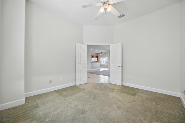 500 Seagate Ln, Saint Augustine, FL 32084 - empty room with a ceiling fan, carpet flooring, and baseboards