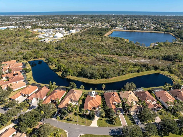 aerial view with a water view and a residential view