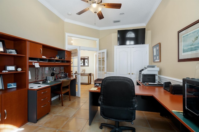 office space with ceiling fan, visible vents, crown molding, and light tile patterned floors