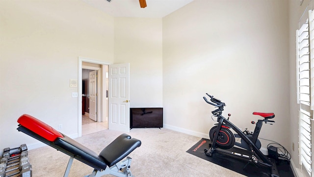 12232 Lashbrook Ct, Jacksonville, FL 32223 - workout area featuring a high ceiling, carpet, baseboards, and ceiling fan