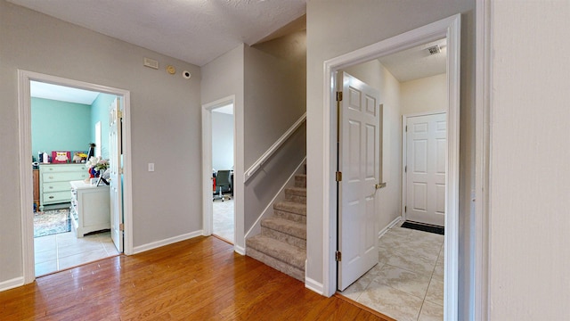 12232 Lashbrook Ct, Jacksonville, FL 32223 - stairway featuring wood finished floors and baseboards