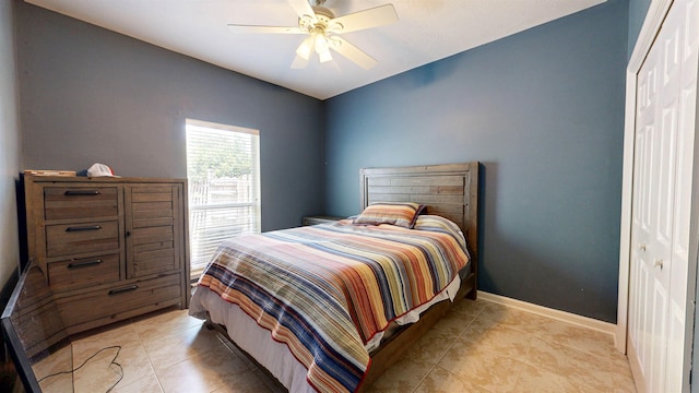 12232 Lashbrook Ct, Jacksonville, FL 32223 - bedroom featuring light tile patterned floors, baseboards, and a ceiling fan