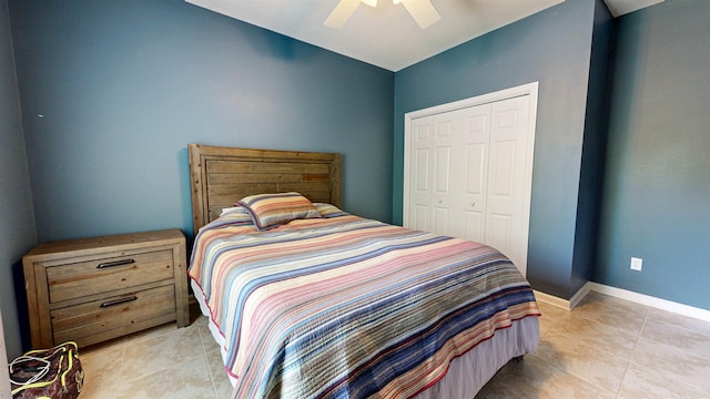 12232 Lashbrook Ct, Jacksonville, FL 32223 - bedroom featuring light tile patterned floors, a closet, ceiling fan, and baseboards