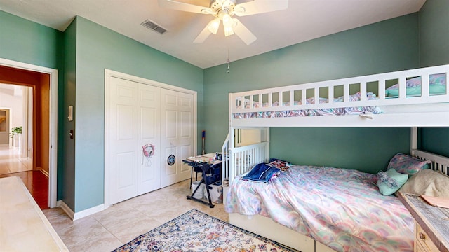 12232 Lashbrook Ct, Jacksonville, FL 32223 - bedroom with a closet, a ceiling fan, baseboards, and tile patterned flooring