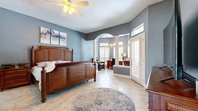 12232 Lashbrook Ct, Jacksonville, FL 32223 - bedroom with ornate columns, arched walkways, light tile patterned floors, and ceiling fan