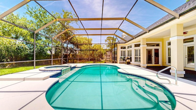 12232 Lashbrook Ct, Jacksonville, FL 32223 - view of swimming pool with a patio area, a pool with connected hot tub, and glass enclosure