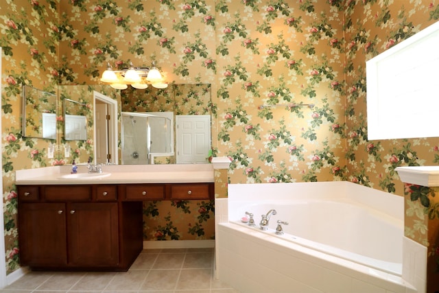 bathroom with tile patterned flooring, vanity, and independent shower and bath