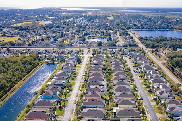 bird's eye view with a water view