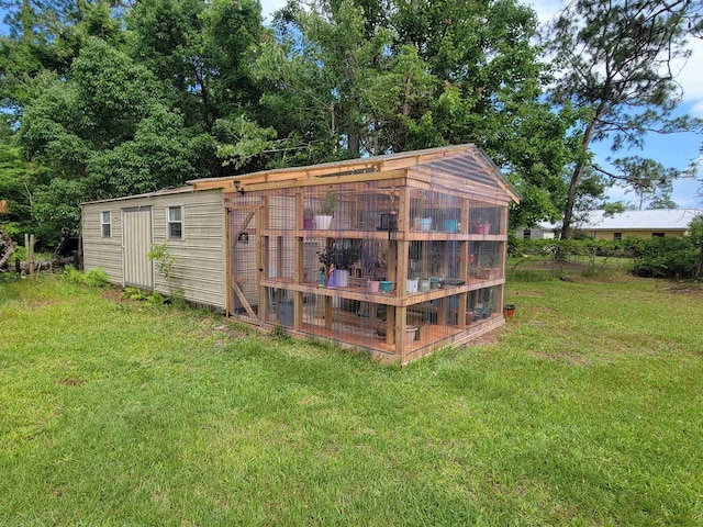2380 Deerwood Acres Dr, Saint Augustine, FL 32084 - view of poultry coop featuring a yard