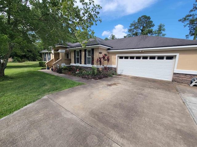 2380 Deerwood Acres Dr, Saint Augustine, FL 32084 - ranch-style home with stone siding, concrete driveway, stucco siding, a front yard, and a garage