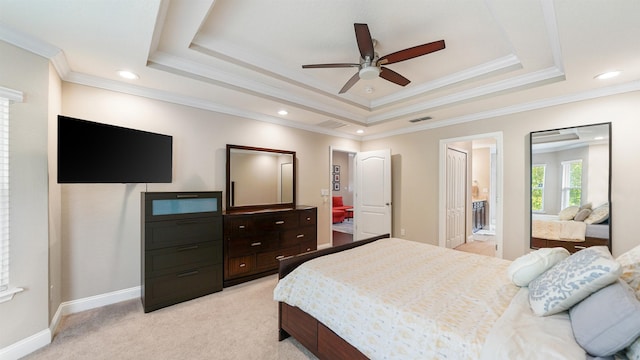 bedroom with crown molding, light carpet, and ceiling fan