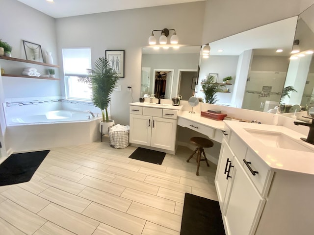 268 Sierras Loop, Saint Augustine, FL 32086 - full bath featuring a shower stall, a garden tub, two vanities, and wood finished floors