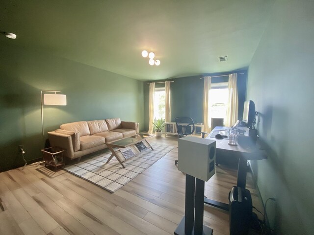 268 Sierras Loop, Saint Augustine, FL 32086 - living room featuring wood finished floors and a desk