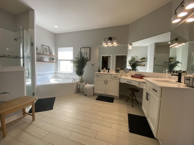268 Sierras Loop, Saint Augustine, FL 32086 - full bathroom featuring a shower stall, a garden tub, two vanities, and recessed lighting