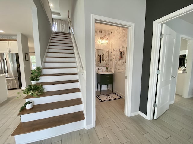 268 Sierras Loop, Saint Augustine, FL 32086 - stairway featuring baseboards and wood finished floors