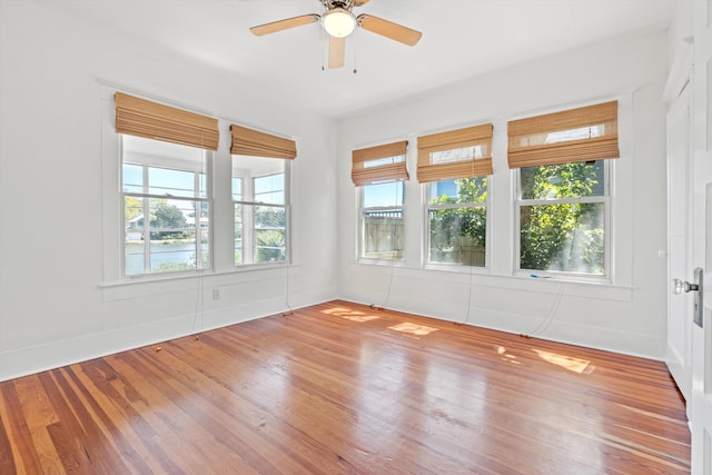 121 Washington St, Saint Augustine, FL 32084 - spare room featuring baseboards, a ceiling fan, and wood finished floors