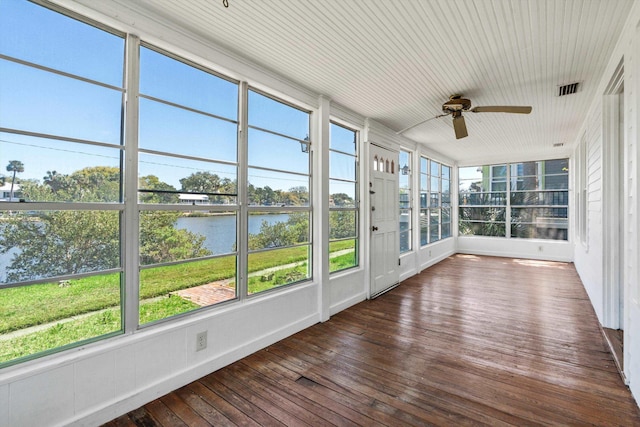 121 Washington St, Saint Augustine, FL 32084 - unfurnished sunroom featuring visible vents, a water view, and a ceiling fan