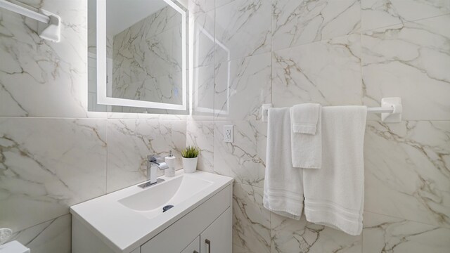 890 A1A Beach Blvd Unit 59, Saint Augustine, FL 32080 - bathroom featuring vanity and tile walls