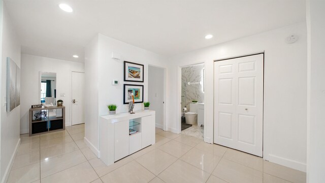 890 A1A Beach Blvd Unit 59, Saint Augustine, FL 32080 - hallway featuring recessed lighting and light tile patterned floors